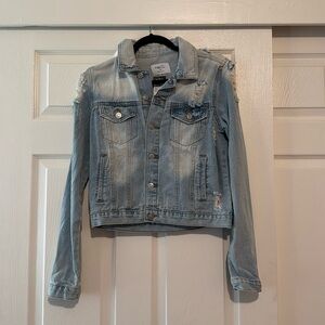 Distressed Jean jacket brand new still has tags on never worn